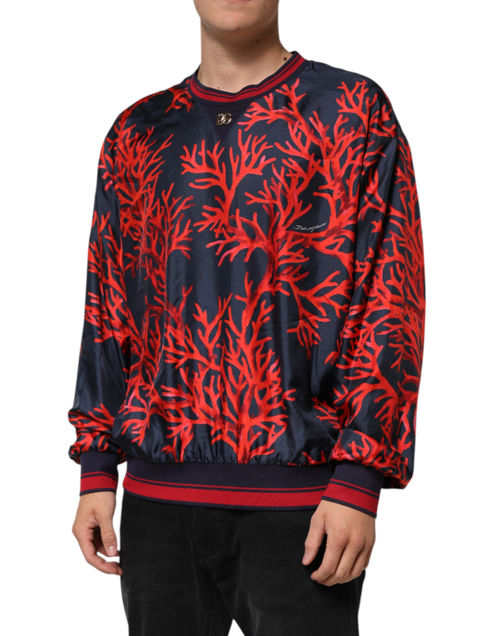 Dolce & Gabbana Marineblauer Pullover mit Korallendruck Pullover aus Seide