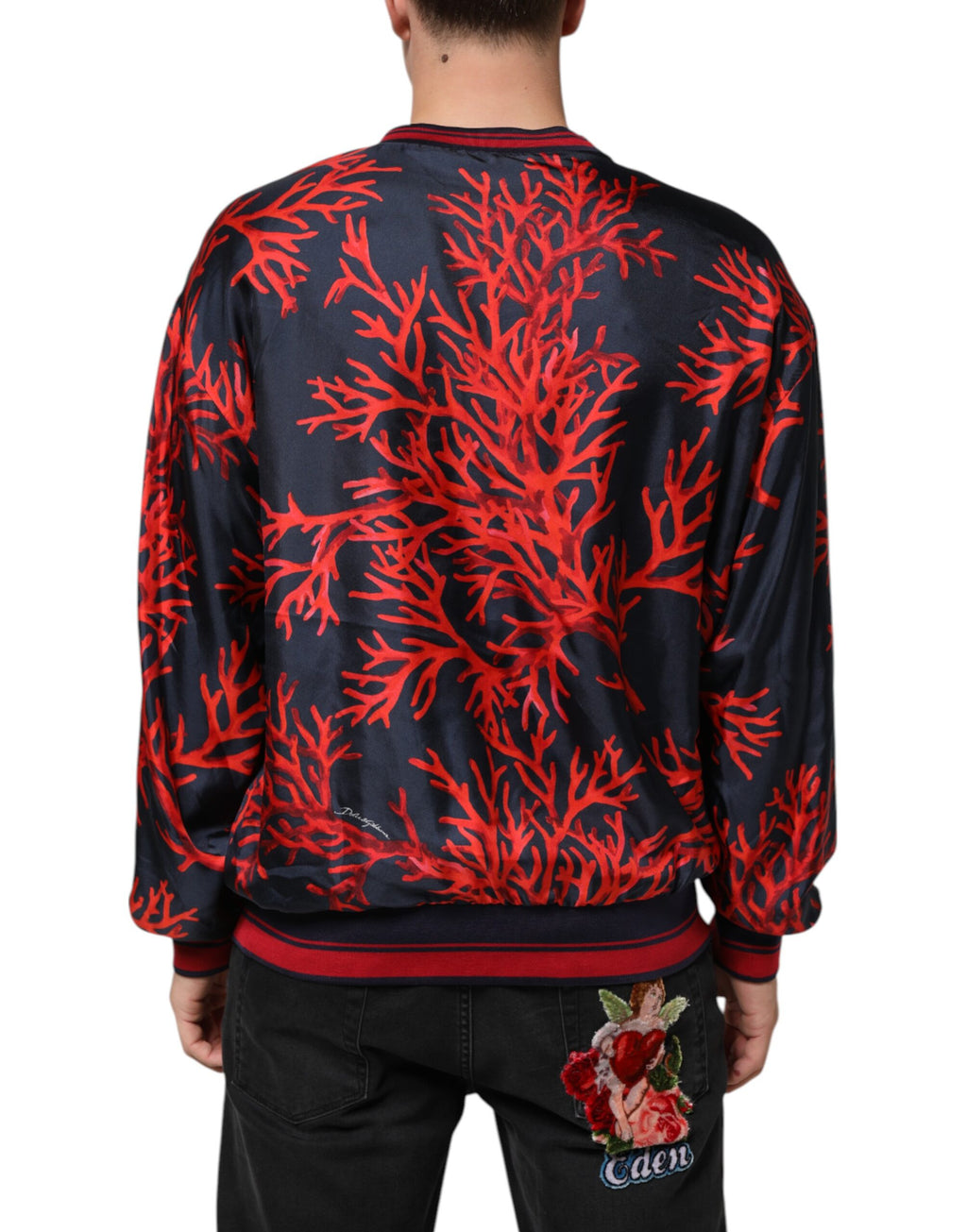 Dolce & Gabbana Marineblauer Pullover mit Korallendruck Pullover aus Seide