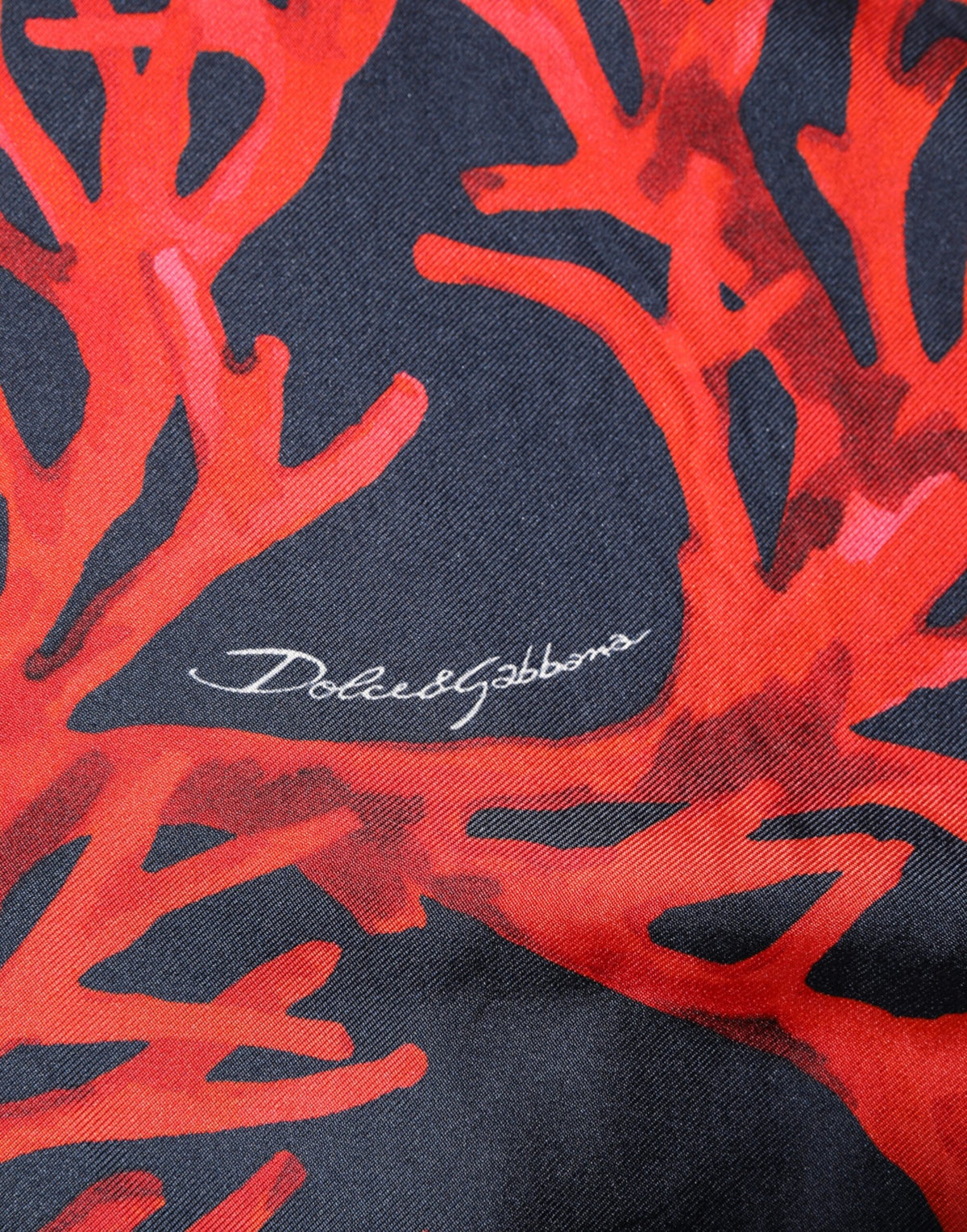 Dolce & Gabbana Marineblauer Pullover mit Korallendruck Pullover aus Seide